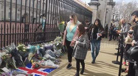 Prince Philip: Scores of well-wishers leave floral tributes at gates of Buckingham Palace