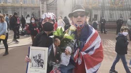 Royal superfans sing 'Bring me Sunshine' in touching tribute to Prince Philip outside gates of Buckingham Palace