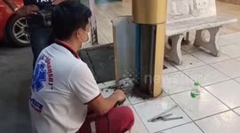 Kitten rescued after getting stuck inside metal pipe outside a jewellery shop