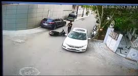 Watch moment furious motorist rams into scooter rider in dramatic CCTV footage