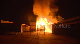 Large fire from burning box truck threatens California apartment complex
