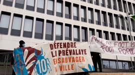 Banners are held in defense of natural areas in Rennes, France