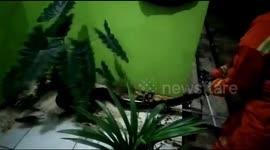 2 meter long snake evacuation enters residents' homes in East Jakarta, Indonesia
