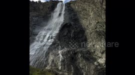 Climbing beautiful waterfall.