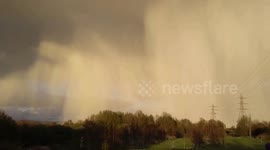 April snow showers pass over parts of Manchester as cold spring continues in England
