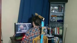 YouTuber builds bizarre robot that corrects bad posture by hitting him on head