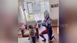 Chinese father dresses up as superhero to surprise son on his birthday