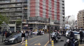 Parisian police cordon off scene outside hospital as hunt for gunman starts
