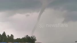 Huge swirling waterspout tornado forms off the coast of Thailand