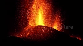 Volcano on France's Reunion island spews lava into night sky