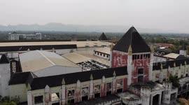 Spooky abandoned shopping mall designed like a medieval castle in Thailand