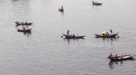 People crossing the Buriganga River, Bangladesh during the coronavirus epidemic