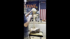 Skilled chainsaw artist carves Jack Skellington out of wood