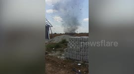 Dust devils whips through dry field in the Philippines