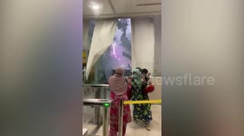 Glass window shatters during violent thunderstorm in Malaysia