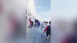 Landmark worth over £11 million is being used as a slide by children in China