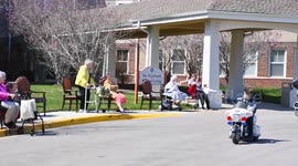 Boy leads police parade around nursing homes in Kansas, US