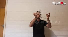 'Australian Juggler Balances Wine Glasses on a Mouthstick'