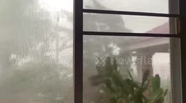 Tropical thunderstorms with hail and rain batter northeast Thailand