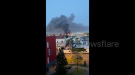 French firefighters battle as blaze engulfs industrial warehouse in northeast Paris