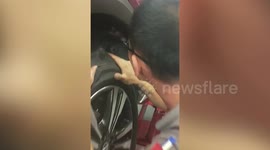 Driver rescues kitten stuck in car wheel in Taiwan