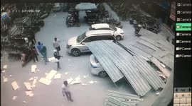 Pedestrian's narrow escape caught on CCTV as building roof crashes to ground in India
