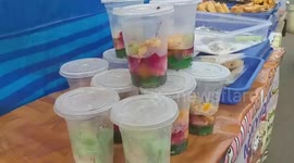Residents buy snacks at Indonesian food market to break their fast