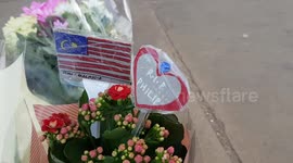 'Thank you for your service': floral tributes continue to be laid outside Buckingham Palace on day of Prince Philip's funeral