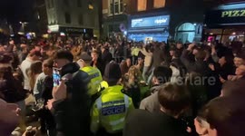 Super Saturday: Police get jeered by revellers during spontaneous street party in London's Soho