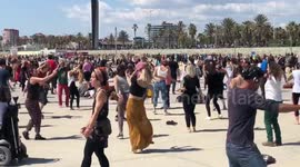 People join silent disco on a sunny day in Barcelona amid COVID-19 restrictions