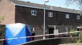 Police launch murder investigation after elderly woman dies after jumping out of a window in house fire
