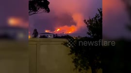 Residents are being evacuated as fires rage near a suburban area in Cape Town, South Africa