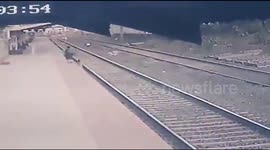 Hero man saves child from the path of train in the nick of time
