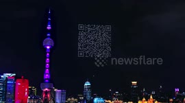 Hundreds of drones form scannable QR code for video game above Shanghai