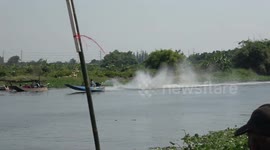 Wooden long boats reach speeds of 100kmh at Thai drag boat racing competition