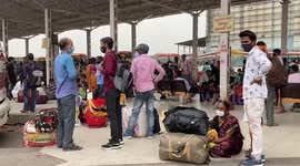 Migrant workers rush home after lockdown announced in northern India
