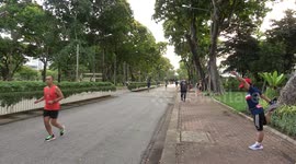 Joggers wear masks in park following Covid-19 resurgence in Thailand