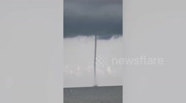 Waterspouts form off the coast of Thailand before tropical storm