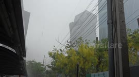 Tropical thunderstorms hit Bangkok as rainy season approaches
