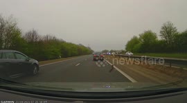 Steel object bounced about on the road, hitting someone's side mirror and my front bumper. A47, Norwich
