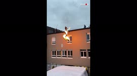 Brave stuntman engulfed in flames leaps off building in France