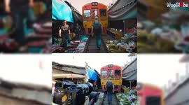 'Footage of Train Passing Through the Famous Maeklong Railway Market'