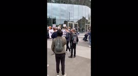 LOW NUMBER OF TOTTENHAM FANS PROTESTING OUTSIDE THE STADIUM