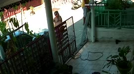 DIY fail! Man drops to ground after his ladder slips while doing repairs