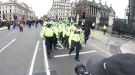 Met Police Marching By London During Kill The Bill Protest With Protesters Shouting After Them