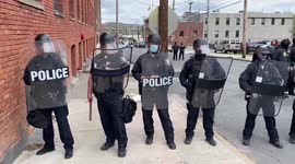 US: Police Line Up Outside South Station As Protesters Continue To Gather In Albany