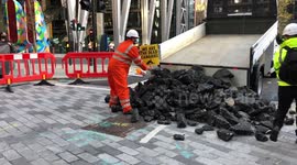 Arrests made after Extinction Rebellion activists drop coal outside Lloyd's of London