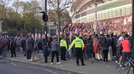 Arsenal fans gather outside Emirates Stadium in protest against Arsenal owner Stan Kroneke