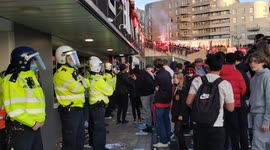 Police get into riot helmets at bottles continue to be thrown at Kroneke Out protest