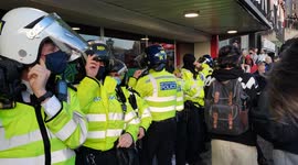 Police don riot gear stop bottle throwing, scuffles at Emirates Stadium as Arsenal fans demand Kroenke out